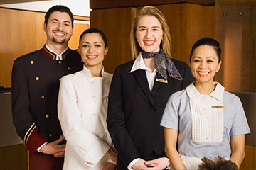 Group of smiling workers in the hospitality industry