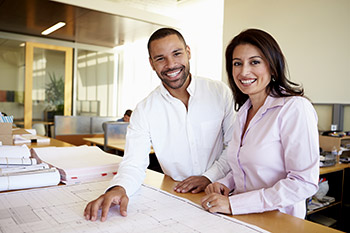 Employees smiling at the camera