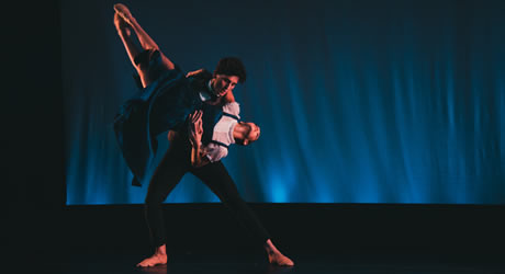 Two dancers performing at the AIR Dance Conference