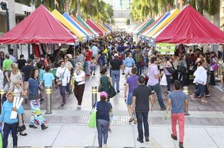 People exploring publisher tents
