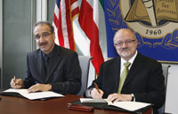 Dr. Ridha M. Al-Khayyat, the director of Kuwait’s Institute for Banking Studies, with MDC President Dr. Eduardo J. Padrón