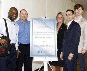 Justin Aldrich Rockefeller (far right) with students and college administrators