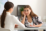 Female student consulting with an academic advisor