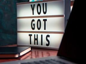 illuminated sign displaying the phrase 