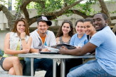 Group of MDC students sitting outside at Kendall Campus