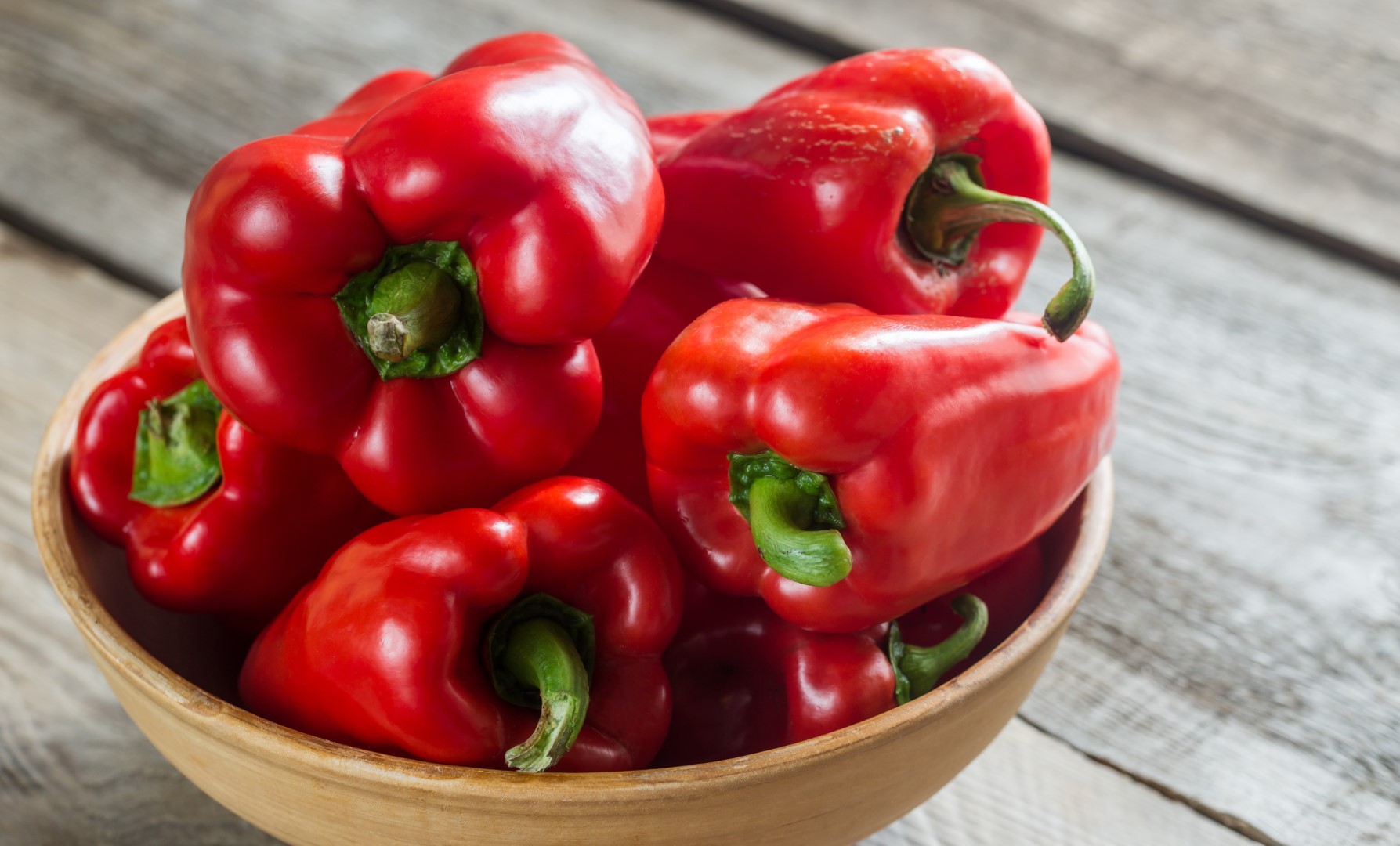 A bowl of red bell peppers