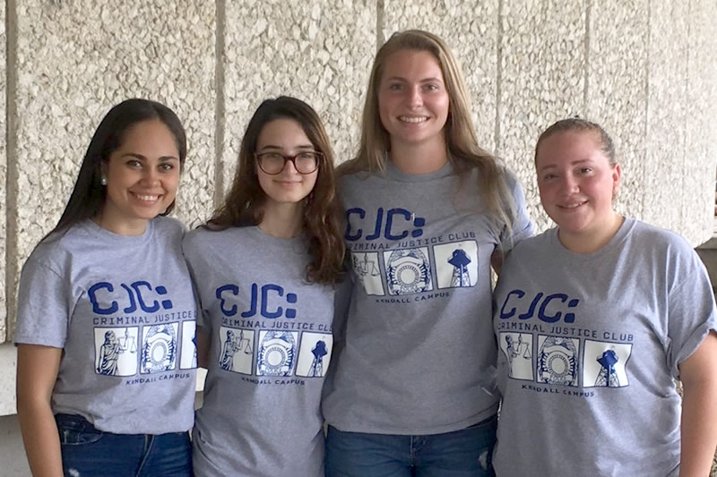 Four women standing together for the Criminal Justice Club