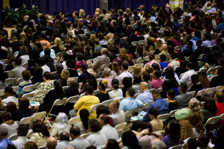 Crowd of faculty and staff sitting during SAI event