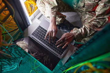 Veteran student using a laptop