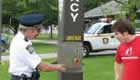 Public safety personel assists student