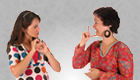 Two women speaking in sign language