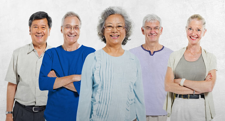 Mixed group of Retirees standing together
