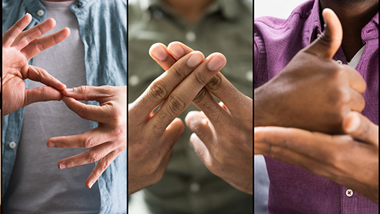 Group of people using American Sign language to communicate
