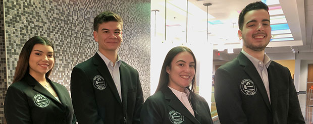 A group of student invovled in student government pose for a picture