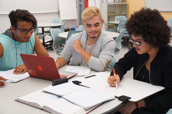 Students engage in course discussion during PLTL