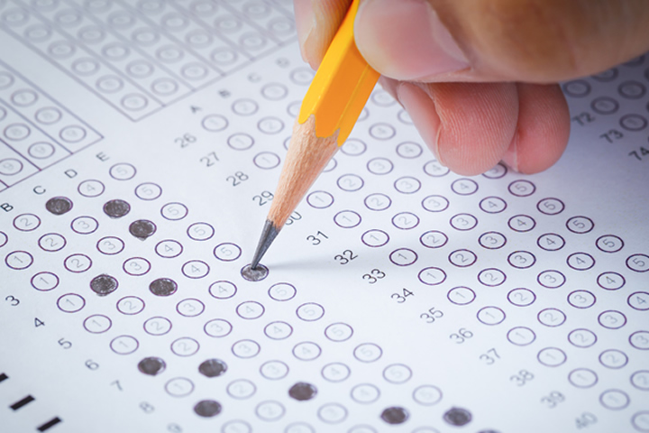 Image of a student's pencil and test sheet